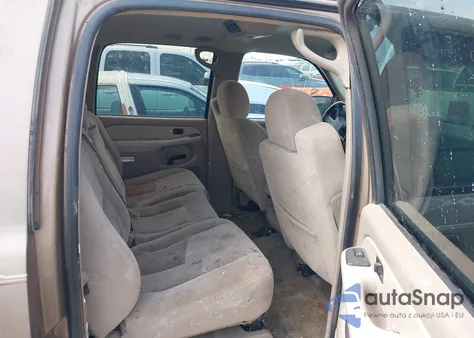 2003 Chevrolet Suburban 1500 Ls z USA, uszkodzony, nr VIN 1GNEC16Z43J208171